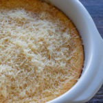 Cream Corn Casserole topped with Parmesan