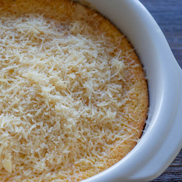 Cream Corn Casserole topped with Parmesan